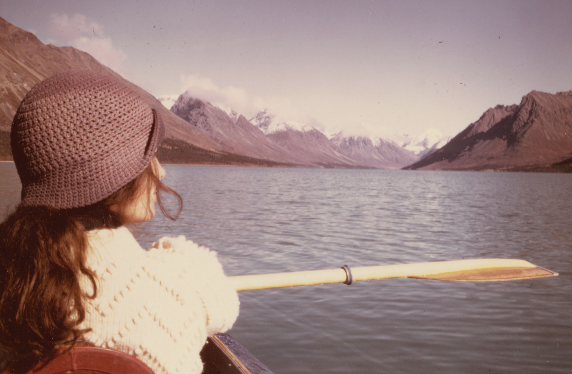 Young woman canoeing in Alaska.